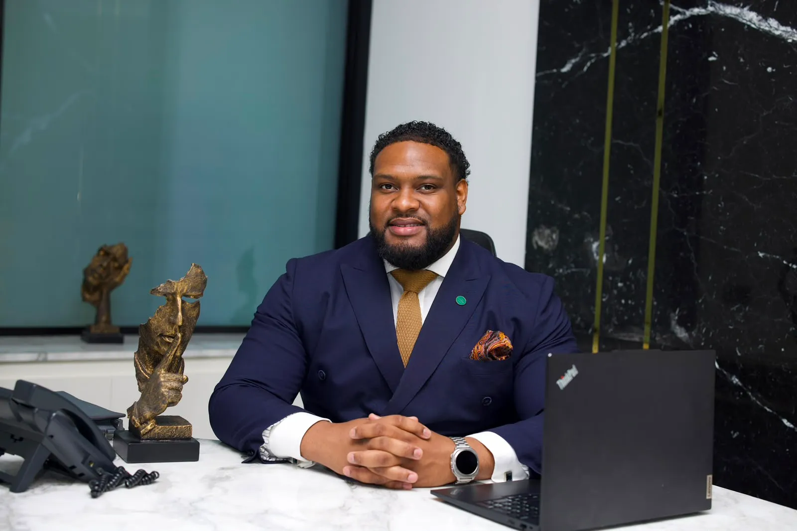 Jamal Akim, UAE real estate advisor, at his desk