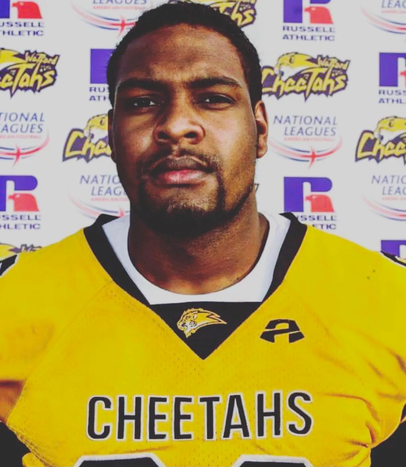Jamal Akim in an American football jersey