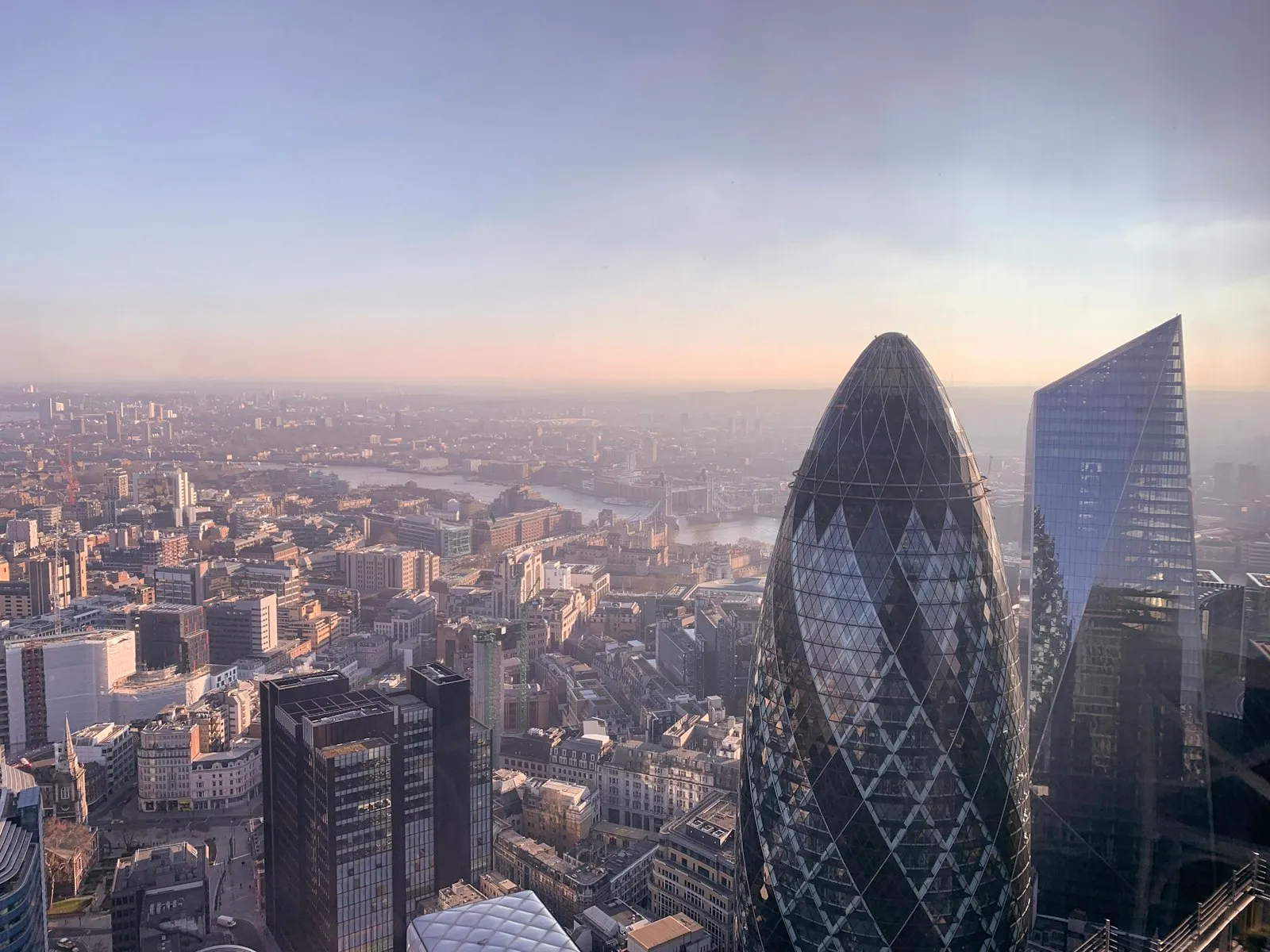The London skyline with the Gherkin building and the Thames River
